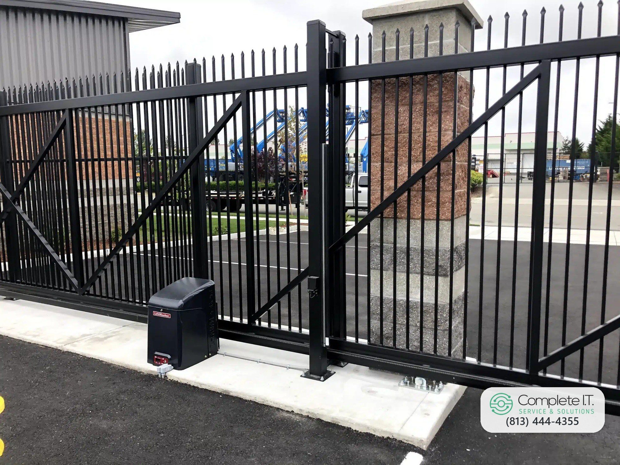Automatic sliding gate and operator at a commercial property